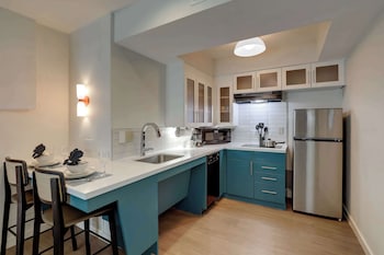 Suite, 2 Queen Beds, Accessible (Mobility/Hearing Shower Two Bedrooms)