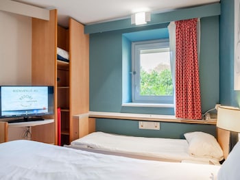 Chambre Triple 2 adultes et 1 enfant (lit simple enfant jusque 12ans)