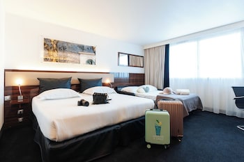 Chambre EXECUTIVE grand lit et canapé-lit pour enfant de 12 ans maximum