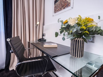 Chambre EXECUTIVE grand lit et canapé-lit pour enfant de 12 ans maximum