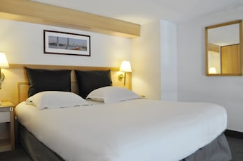 Suite AFFAIRES grand lit et canapé-lit pour enfant de 12 ans maximum